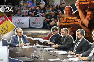 A imagem apresenta uma montagem de momentos importantes relacionados às lutas sindicais promovidas pelo SINJUS-MG em 2024. Nela, há pessoas segurando cartazes com mensagens de protesto. Também aparecem faixas de organizações como FENAJUD e SINJUS-MG, além de uma foto de uma reunião formal com representantes debatendo em uma mesa. Em destaque, a frase: "SINJUS supera desafios e garante conquistas importantes para os servidores em 2024". A composição reflete o protagonismo do sindicato na defesa de direitos dos servidores públicos.